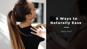 Woman getting a massage with the words saying, 5 ways to naturally ease back pain