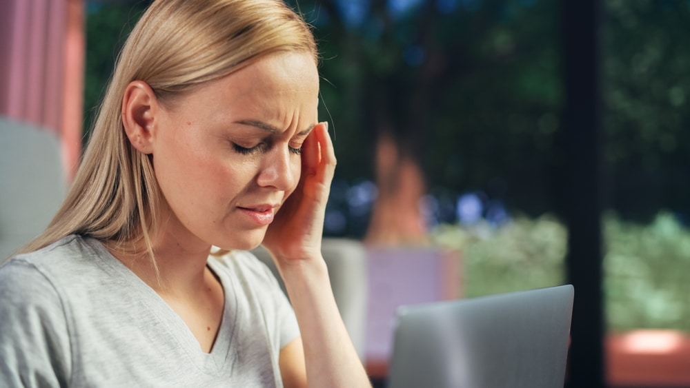 Photo of a Woman Sufferring from Headache